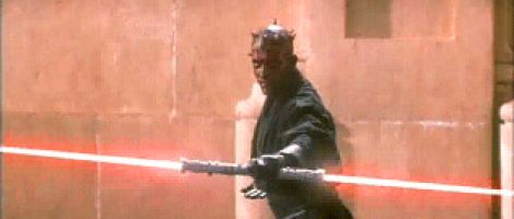 Darth Maul whips out his double bladed saber for a kick-butt fight